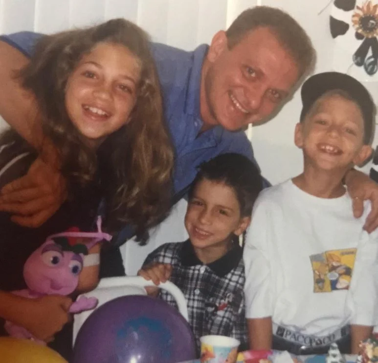 Childhood photo of Eros with his family