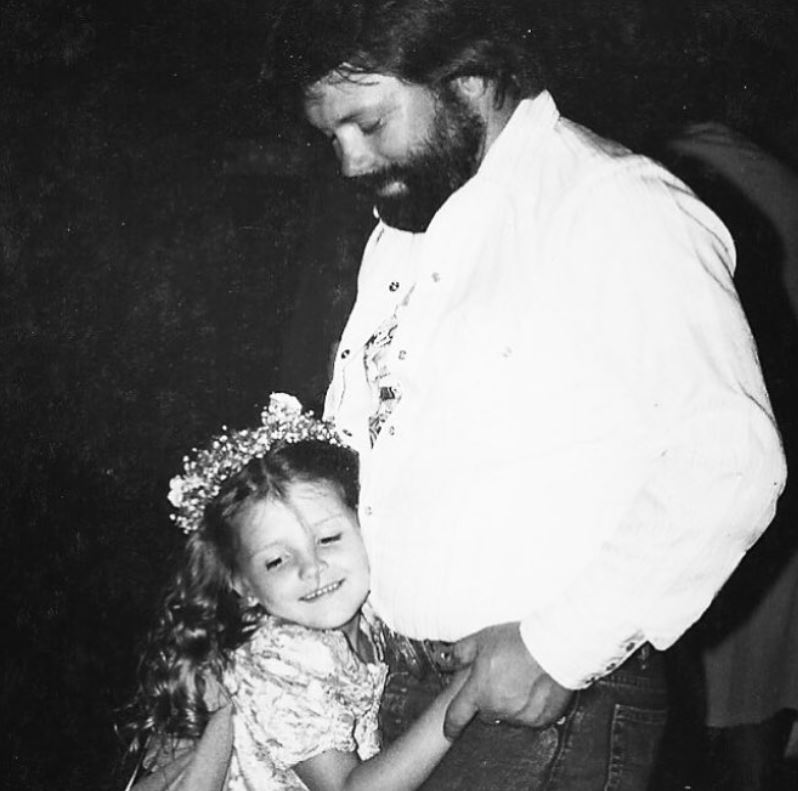 Childhood photo of Katrina with her dad