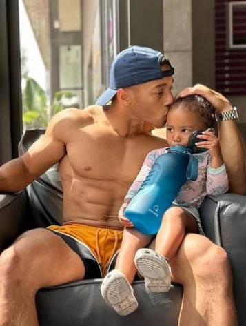 Trevor Bell with his daughter