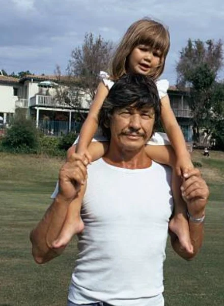 Young Zuleika with her dad