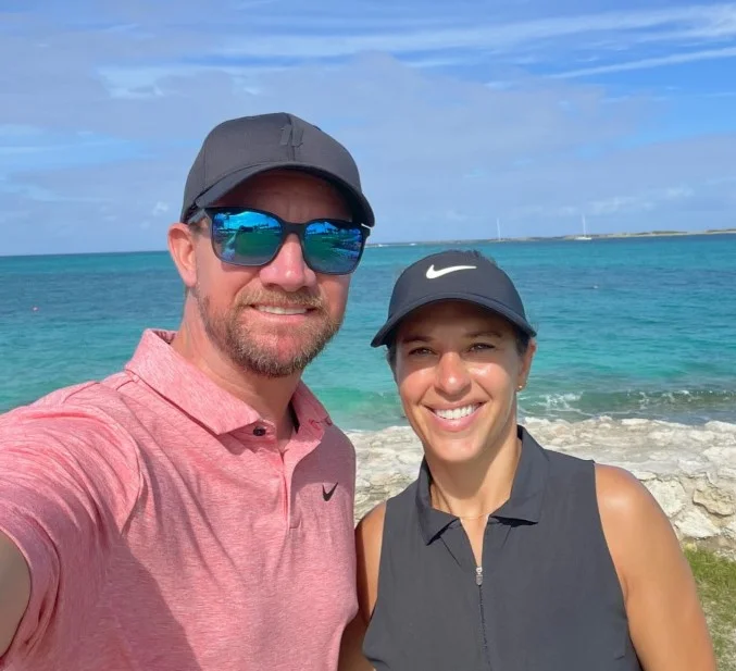 Brian Hollins with his wife