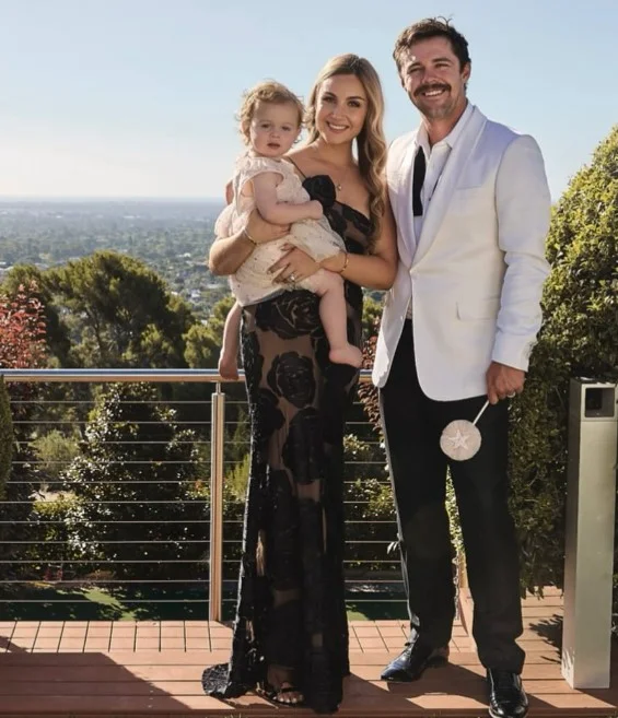 Jessica Davies with her husband and daughter