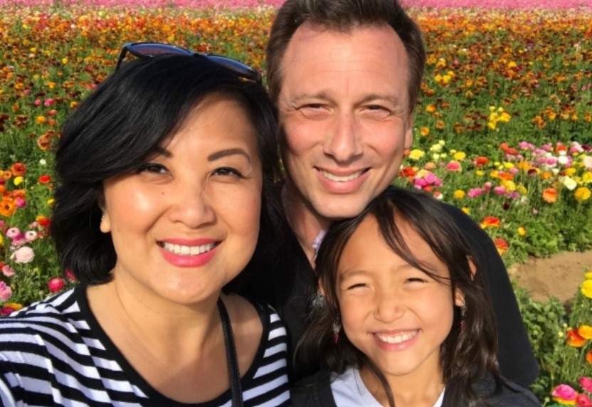 Mai Do Burrous with her husband and daughter