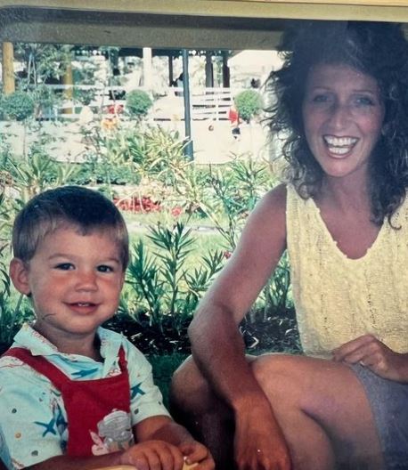 Childhood photo of Chris Taylor with his mother