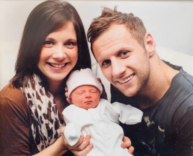 Rob Burrow with his wife and kid