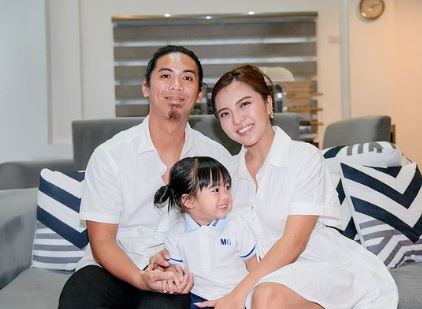 Viy Cortez with her husband and son