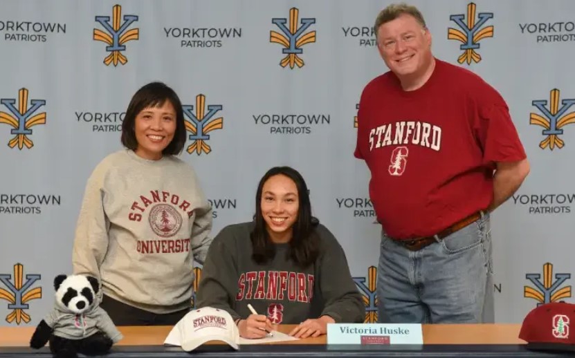 Torri Huske with her parents