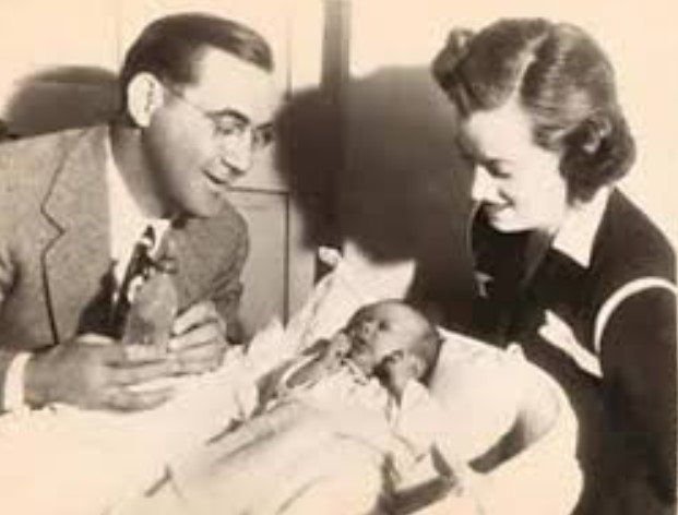 Alice Hammond Duckworth with her husband and kid