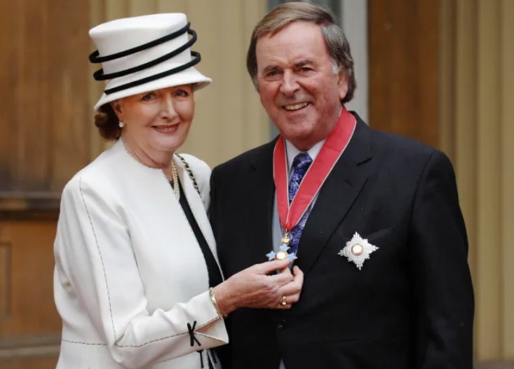 Helen with Terry after he was awarded an OBE