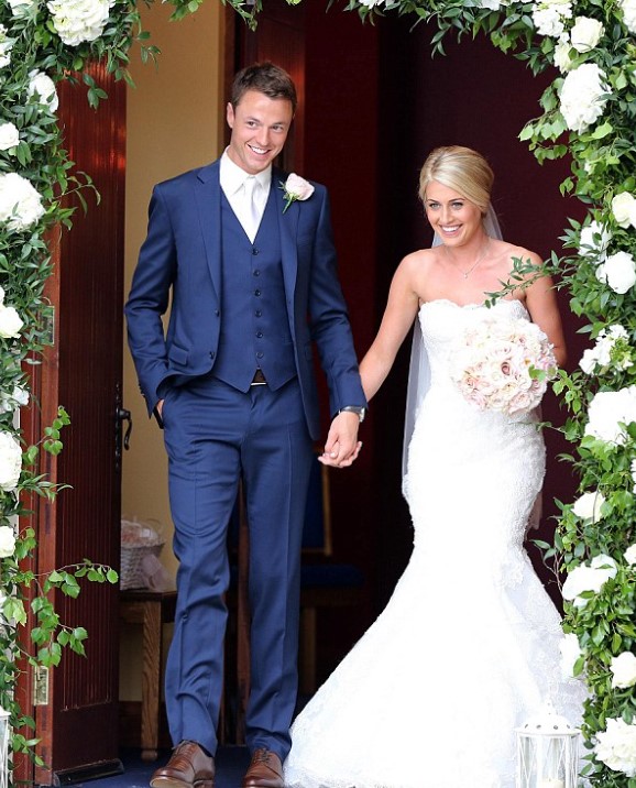 Helen McConnell and her husband Jonny Evans' wedding image