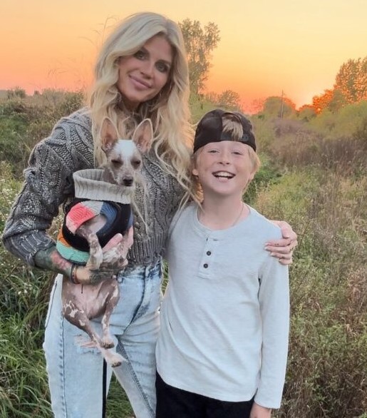Carolyn Wiger with her son and dog