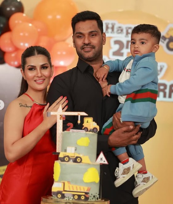 Apoorva S Rao with her husband and son
