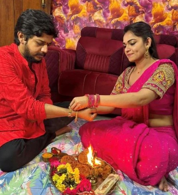 Ashwini Sri with her brother