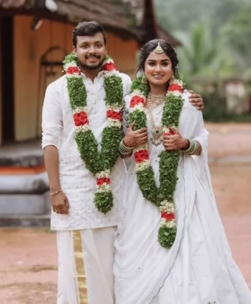 Haritha G. Nair and her husband's wedding image