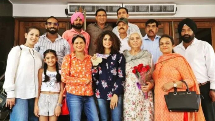 Harmilan Bains with her family