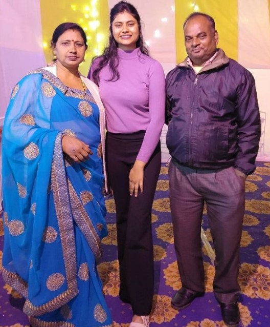 Rubina Francis with her parents