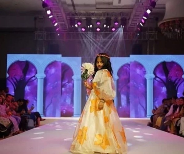 Ssara Palekar walking the ramp in a fashion show