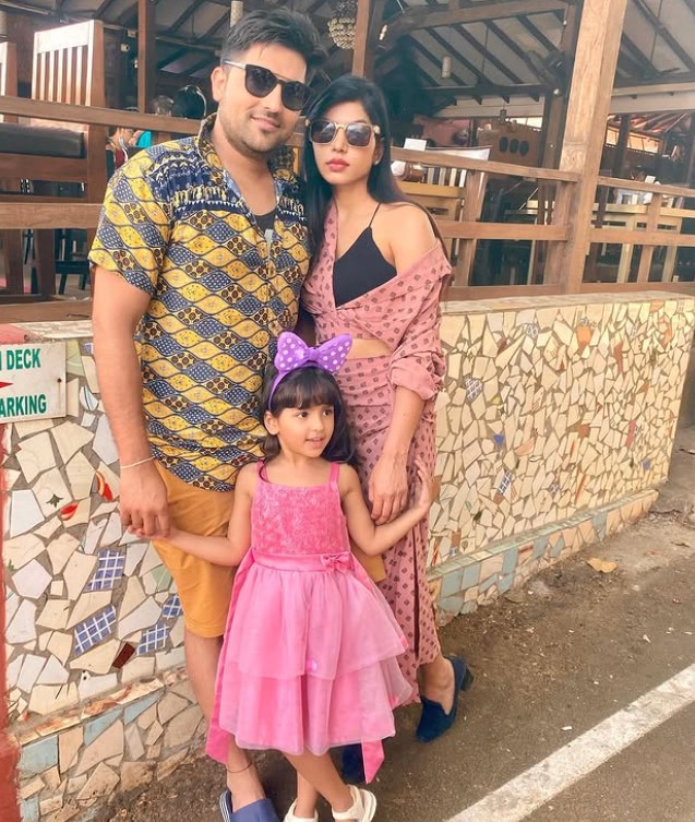 Jiyanish with her husband and daughter