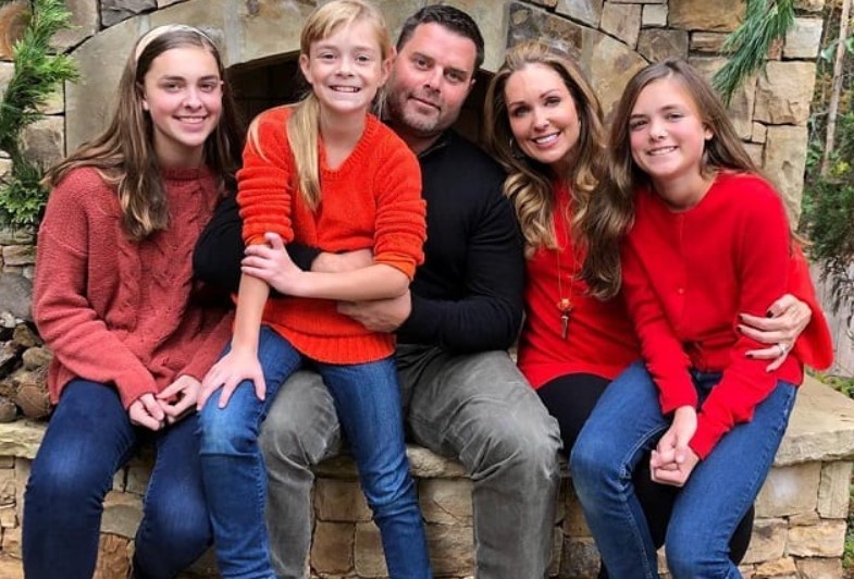 Christi Paul with her husband and kids