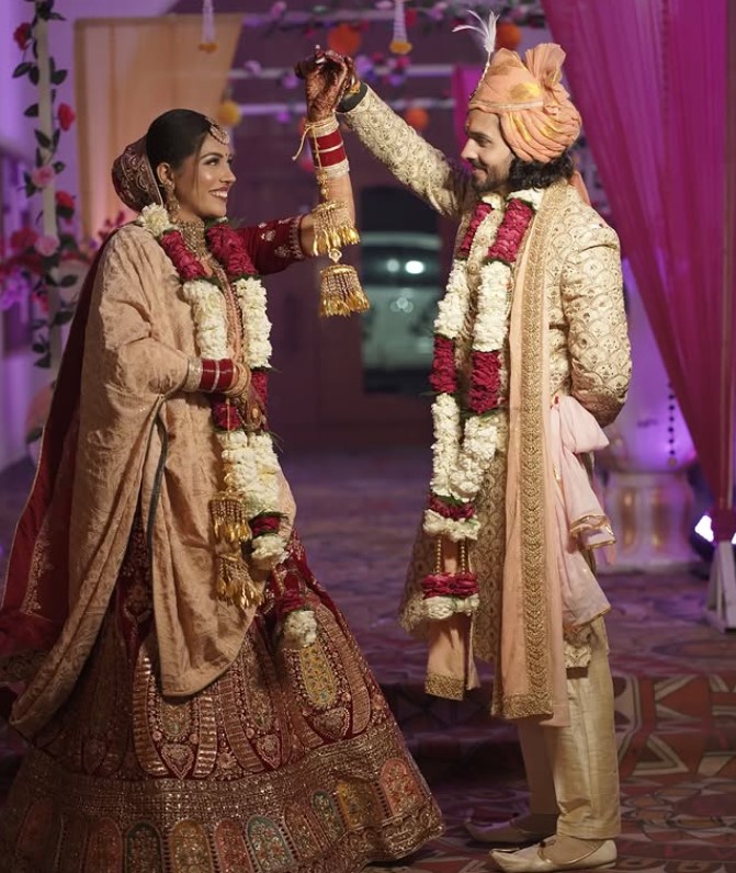 Falguni Bhatia and her husband's wedding image