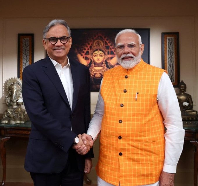 Manoranjan Bharati with Narendra Modi