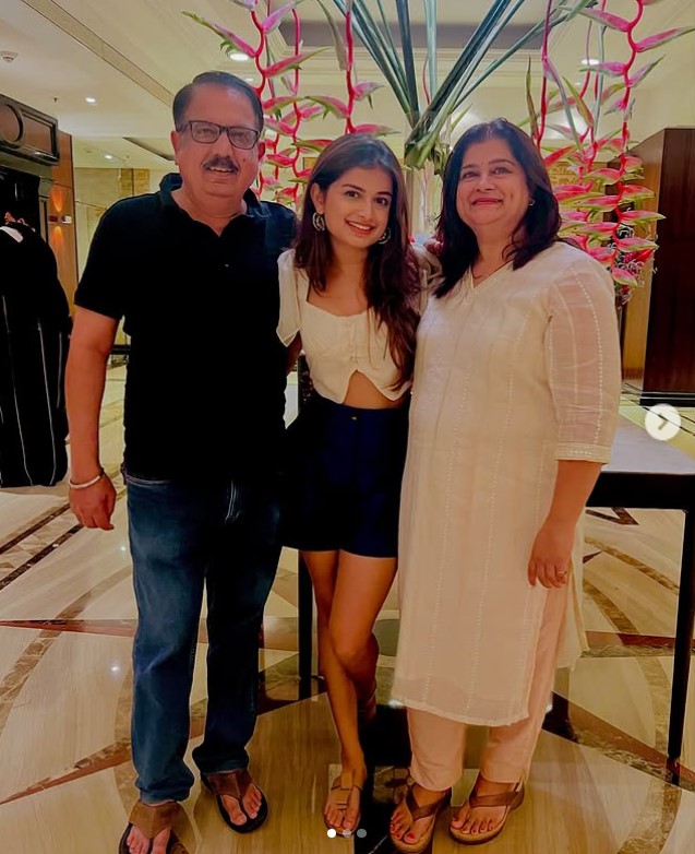 Hemal Ingle with her parents
