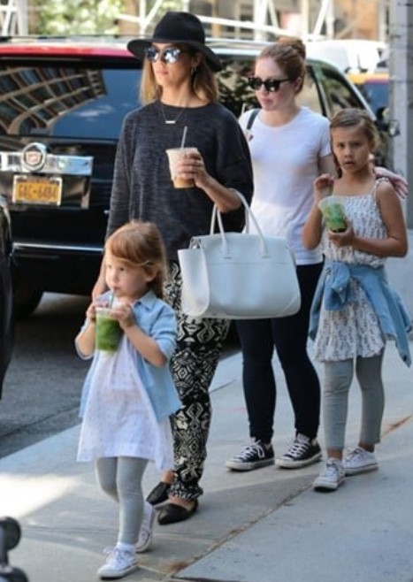 Jessica Ditzel with her daughters and their nanny (white top)