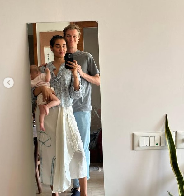 Kanishtha Dhankar with her husband and daughter