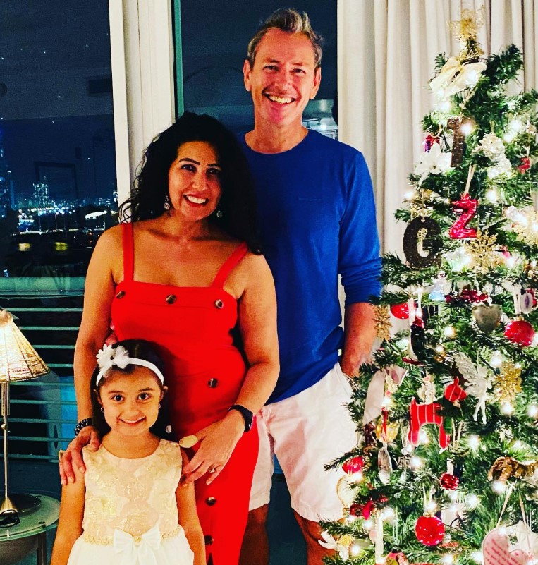 Tina Engineer with her husband and daughter