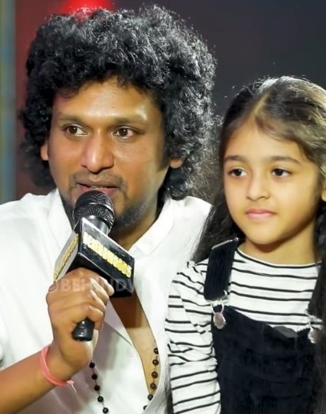 Adhvika Lokesh with her father