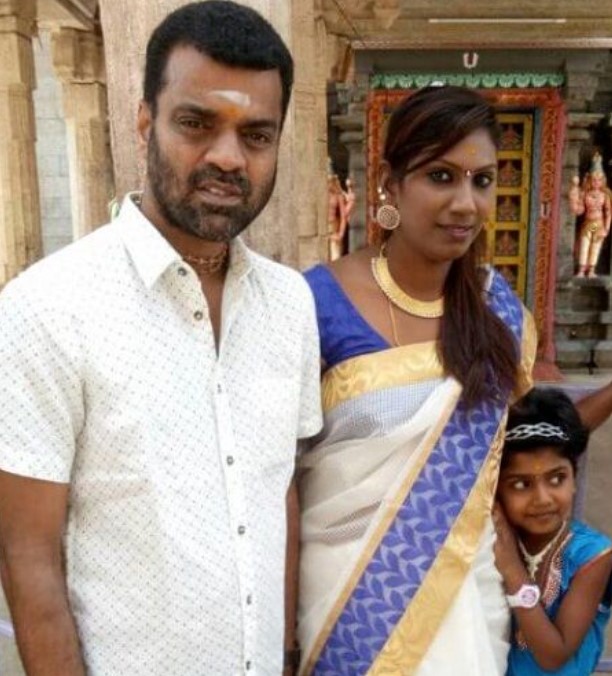 Nithya Balaji with her husband and daughter
