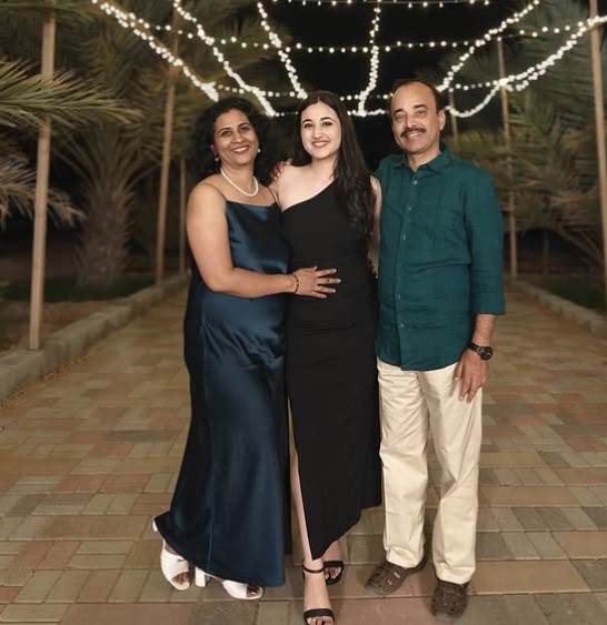 Revathi Pillai with her parents