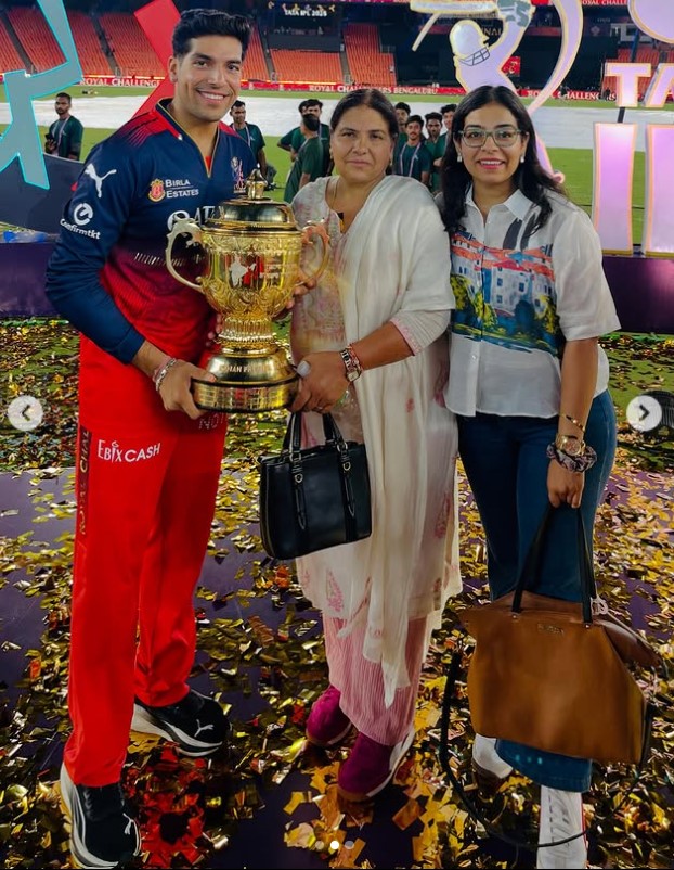Swastik Chikara with his mother and sister