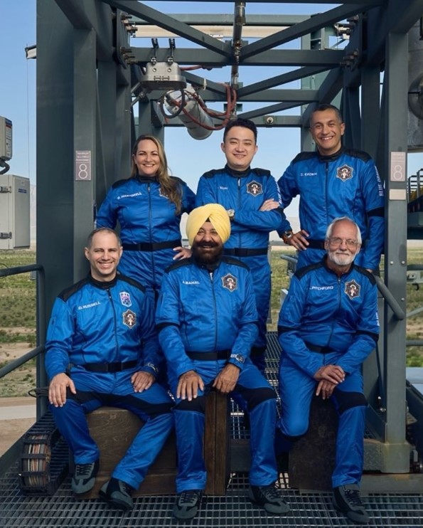 Arvinder ‘Arvi’ Singh Bahal (centre) with some of the others set for Blue Origin’s space tourism flight NS-34