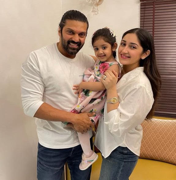 Sayyeshaa Saigal with her husband and daughter