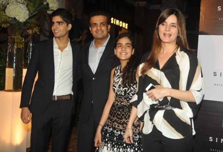 Simone Khan Arora with her husband and children