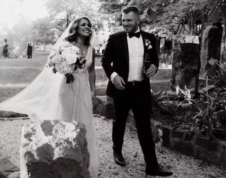 Amy Griffiths and her husband's weddding image