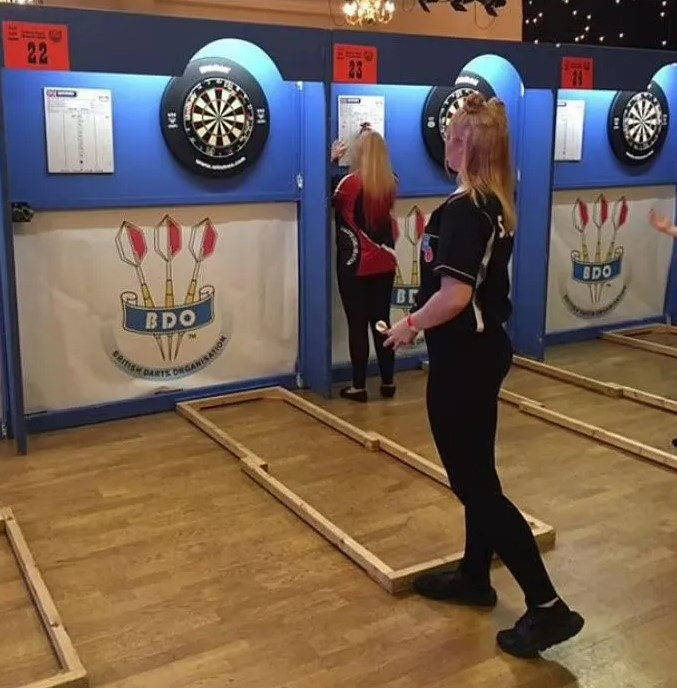 Eloise plays amateur darts in her spare time
