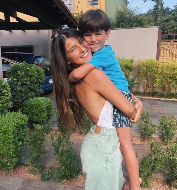 Giovana Baptista with her brother