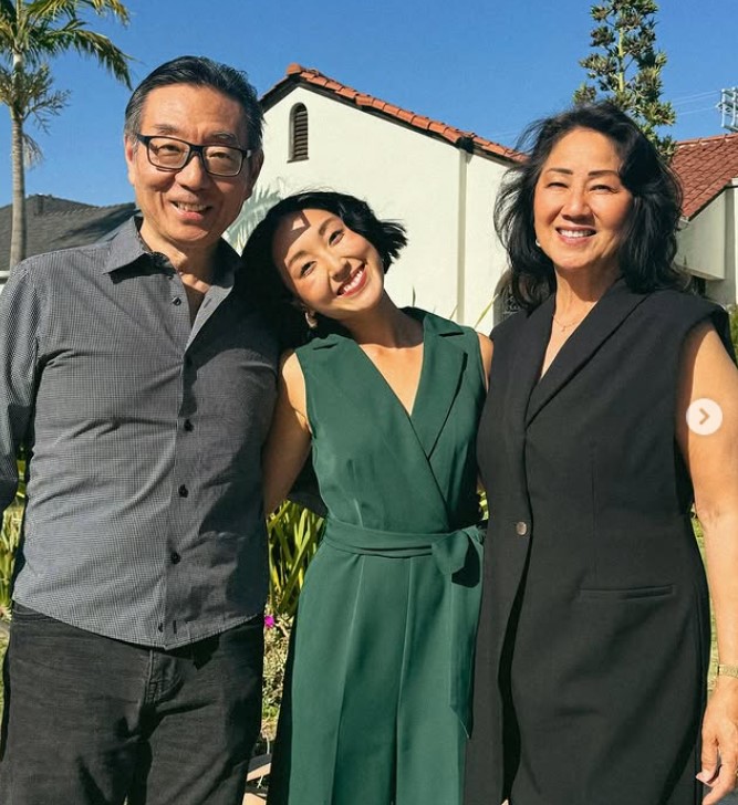Kelly U with her parents