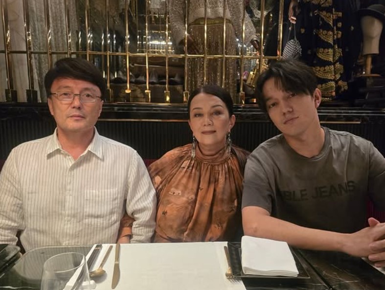 Sveta Aitbaeva with her husband and son