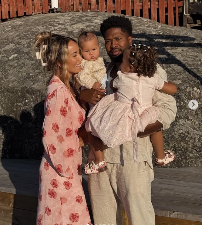 Tanby with her husband and kids