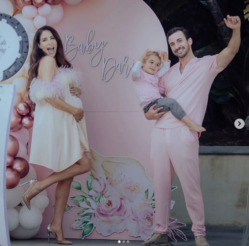 Ekin Ozlen with her husband and kid
