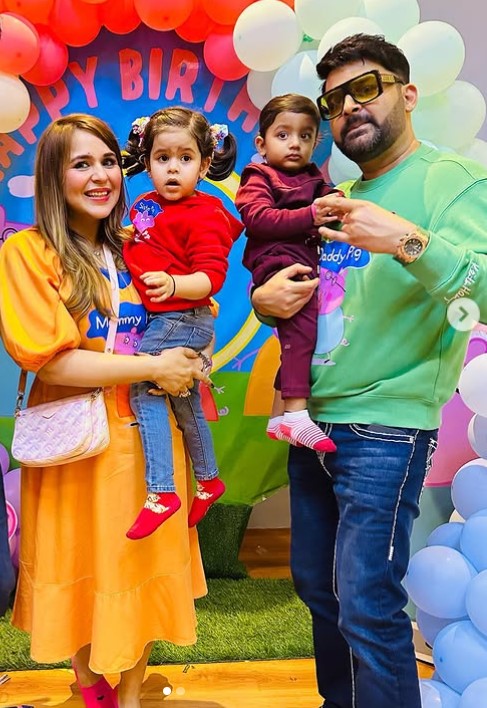 Ginni Chatrath with her husband and kids