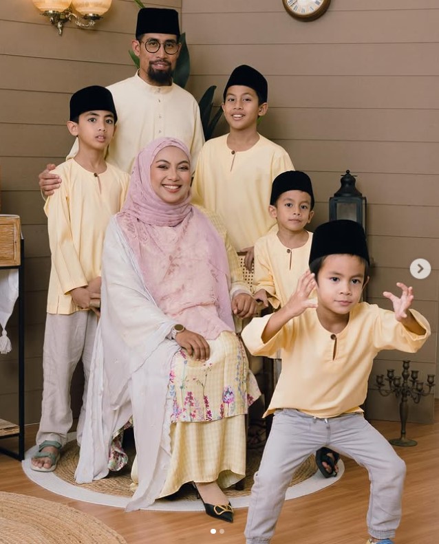 Dr Husna Zahry with her husband and sons