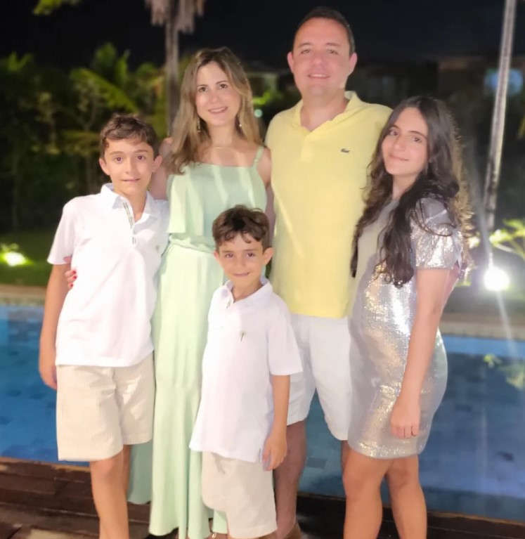 Frederico Amado with his wife and kids