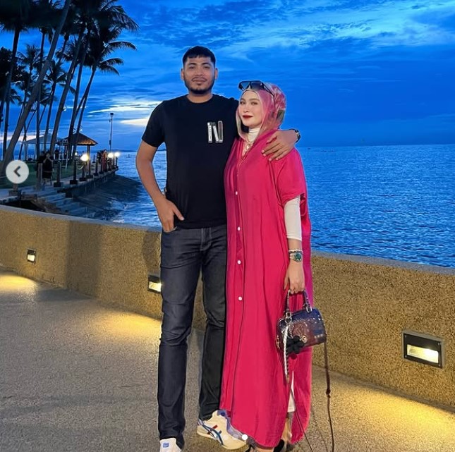 Mamat Sepah with his wife Cik Nana