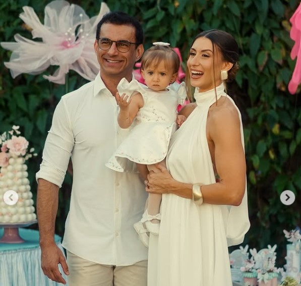 Aline Mareto with her husband and kid