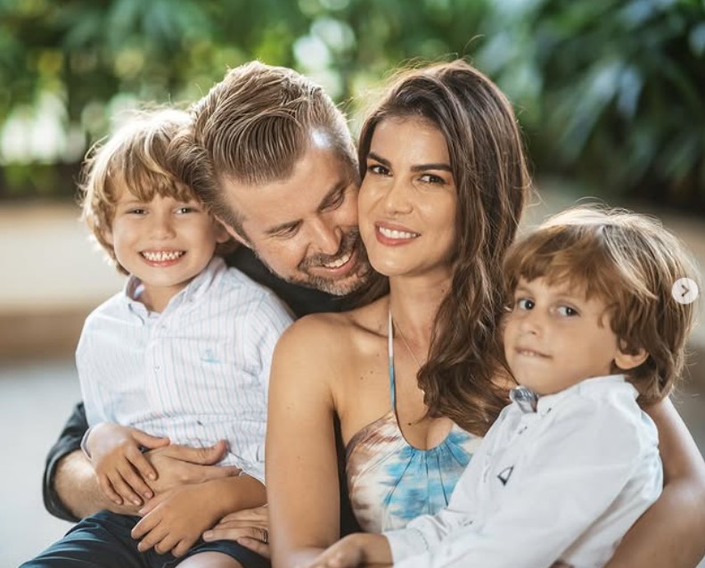 Marianne Cruz with her husband and kids