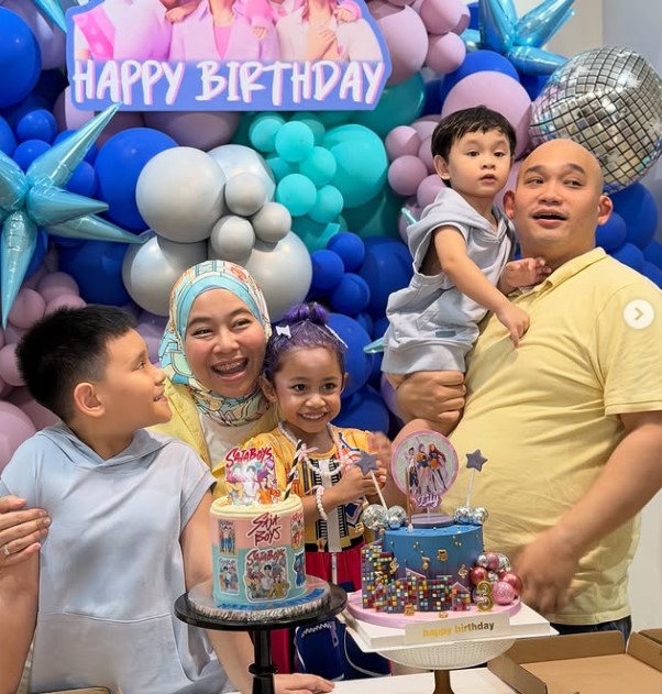 Didiyana Ehsan with her husband and kids
